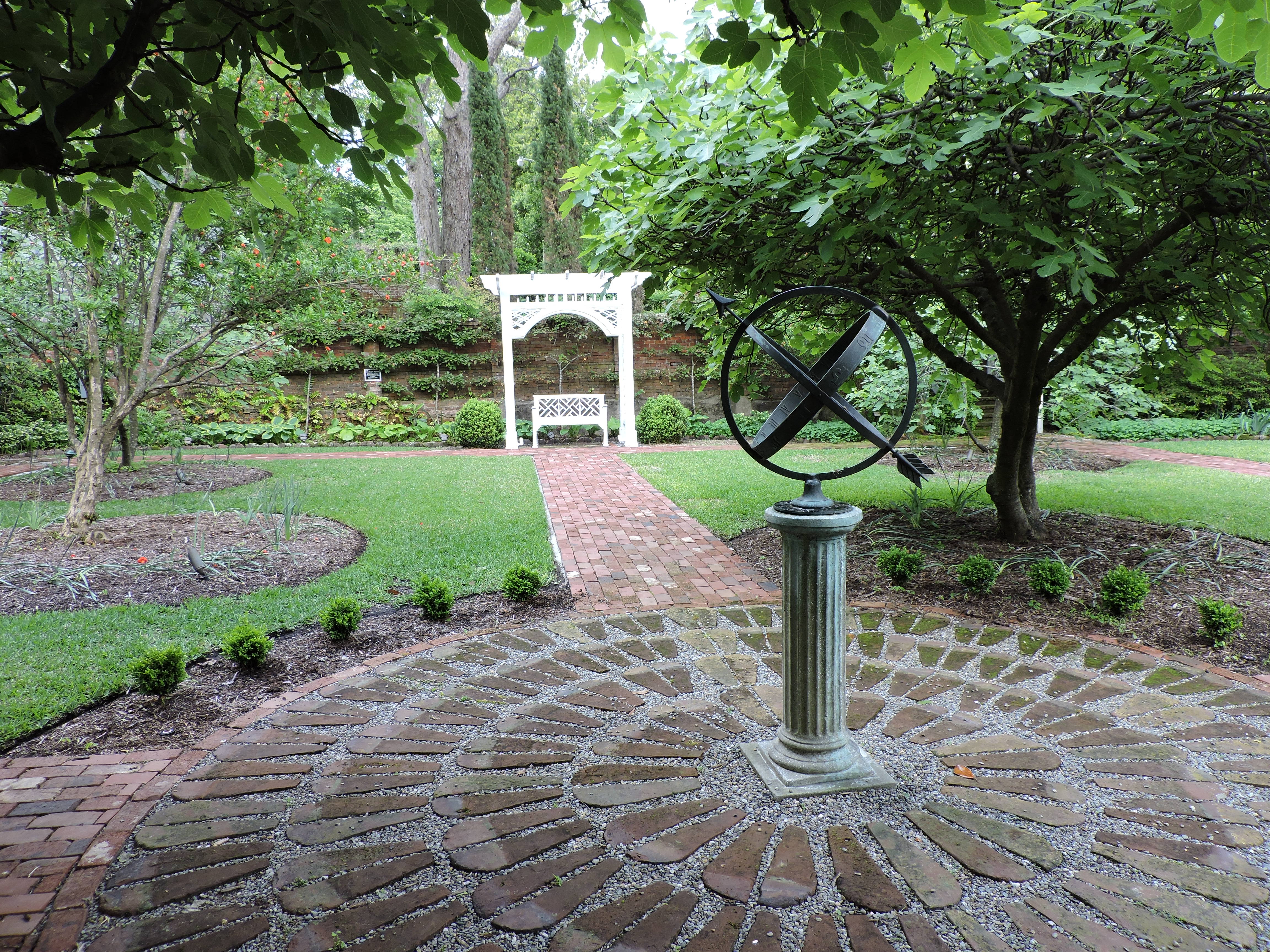 pergola and paths in Burgwin-Wright House gardens
