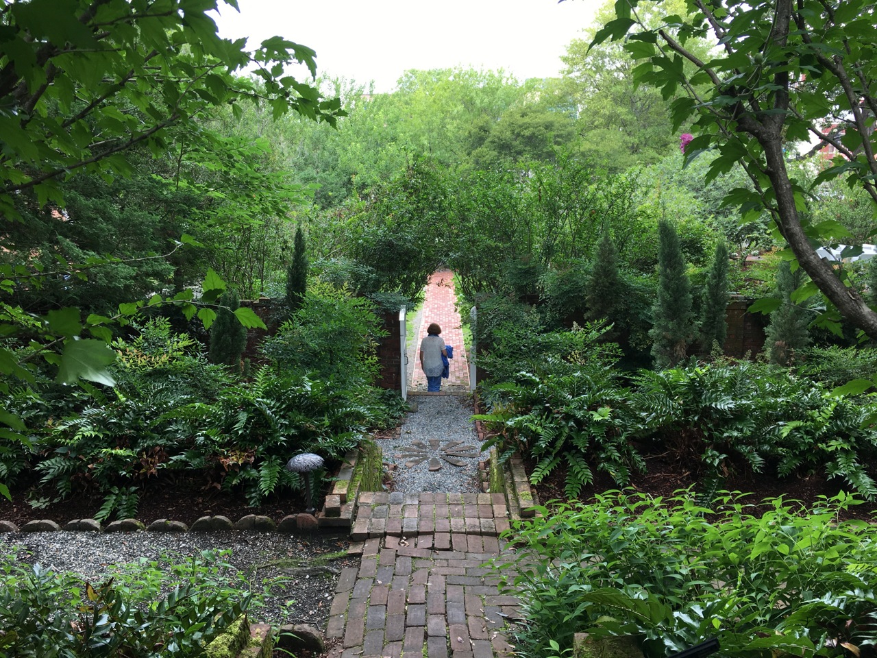 Jocelyn Lynch in the Burgwin-Wright House gardens