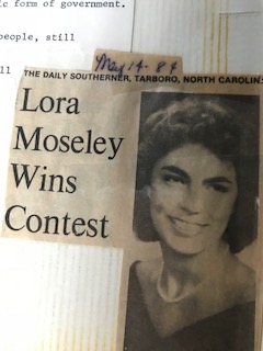 Lora Moseley news paper clipping