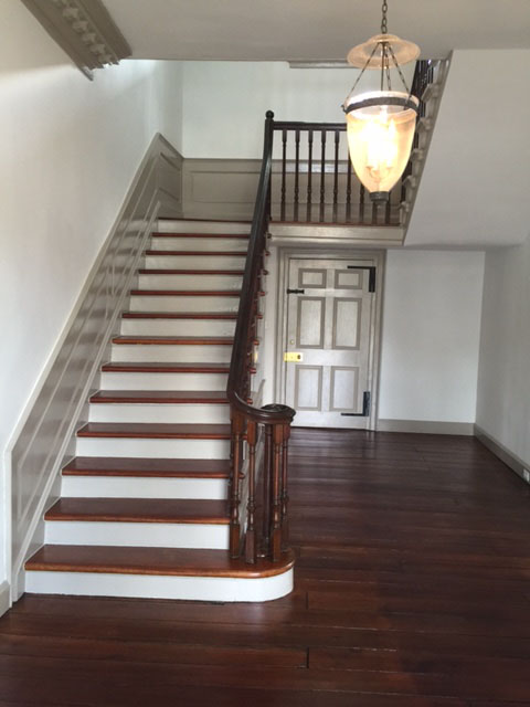 Restored walls, trim and floors of foyer and stairwell at the Burgwin-Wright House